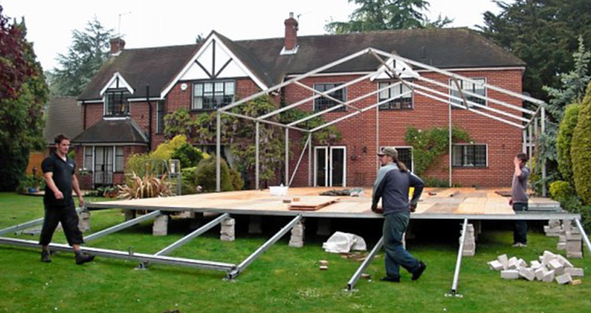 Putting up a marquee in the garden